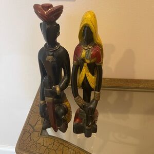 Two wooden figures. Man and woman they are beautiful